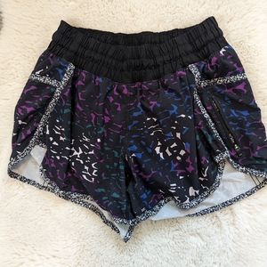 Lululemon black/purple/blue pocketed running shorts